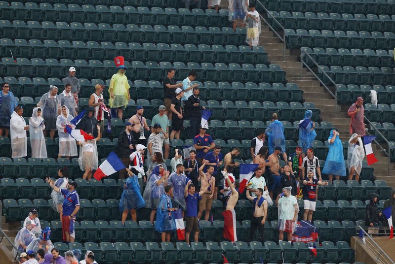 France-Iraq World Cup game restarts after two-hour storm delay