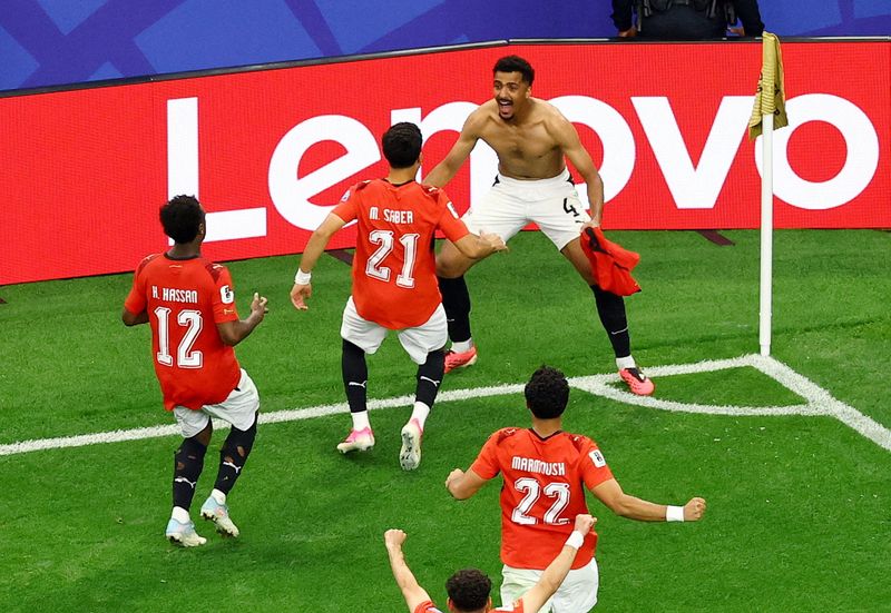 Egypt edge Australia on penalties to reach World Cup last 16