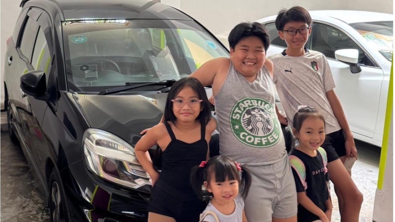 As a mum of five in Singapore, my car doesn't buy me status. It buys me time