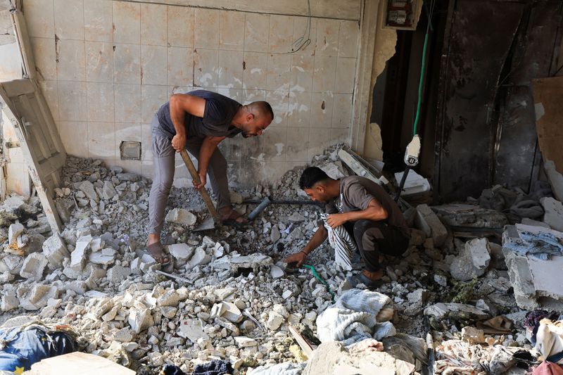 Israeli strikes kill 18 in Gaza, minister says no deal to halt attacks