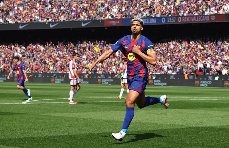 Liverpool bolster injury-hit defence with loan signing of Barca's Araujo
