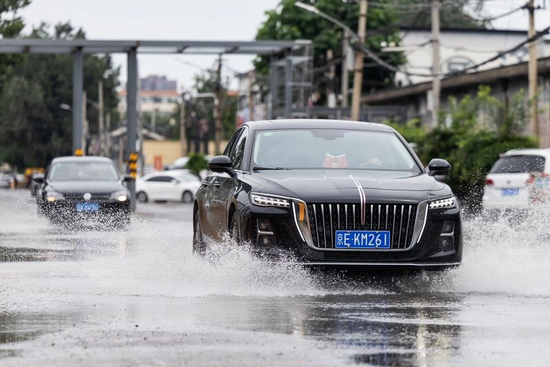 Rain pounds Beijing as Typhoon Dolphin sweeps through China