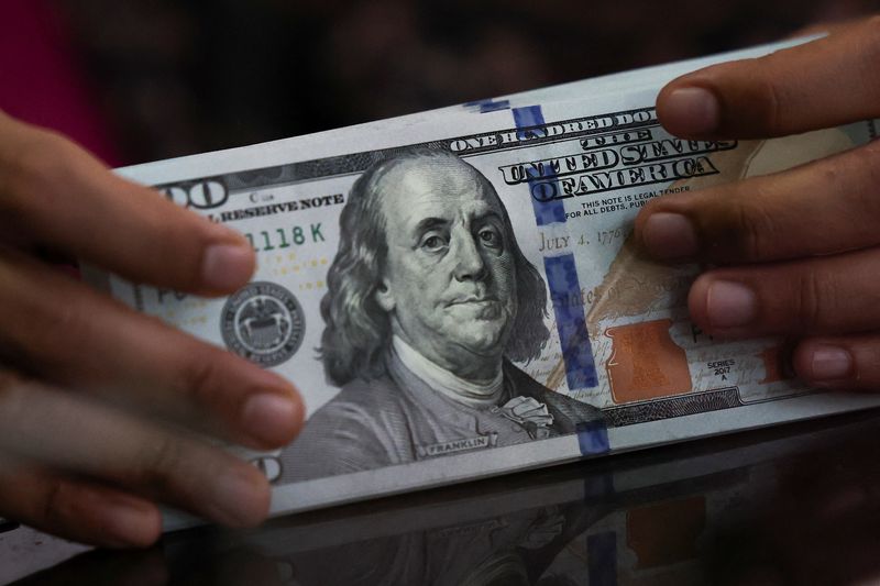 Dollar wobbles as Treasury's bond market buybacks raise fresh concerns