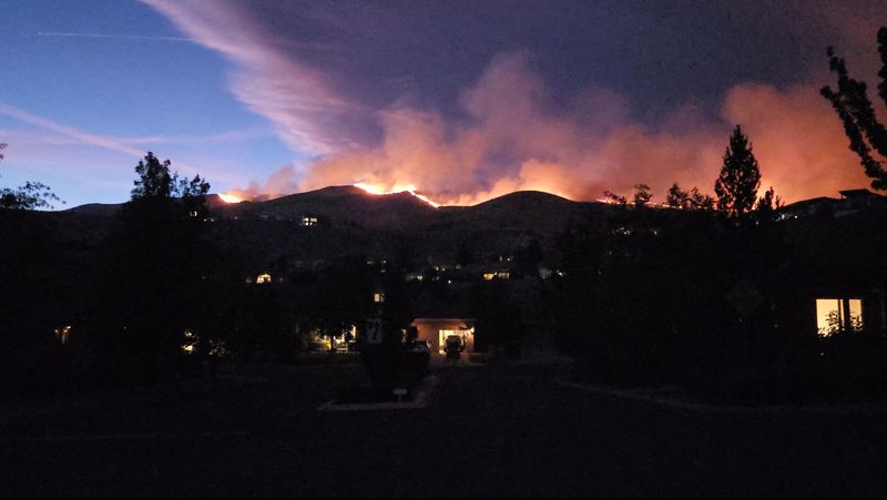 Tens of thousands evacuated as fire bears down on US city