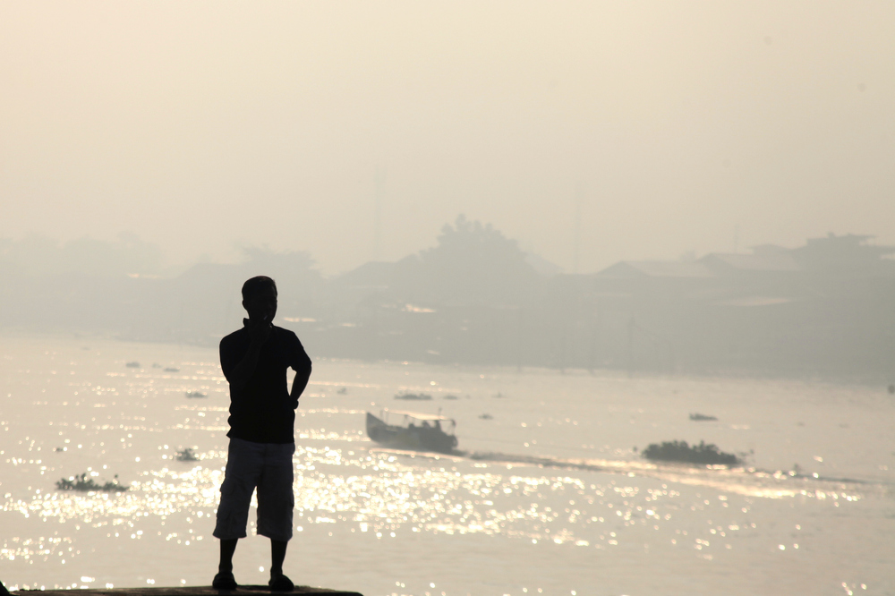 Indonesia escalates battle against fires, putrid haze