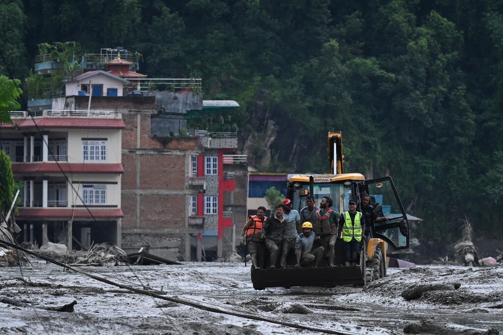 Hundreds missing as rescuers race to find survivors after deadly Nepal-Tibet floods