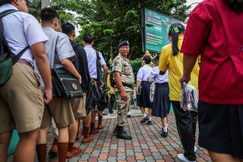 After student's shooting rampage, Thai school reopens under tight security 