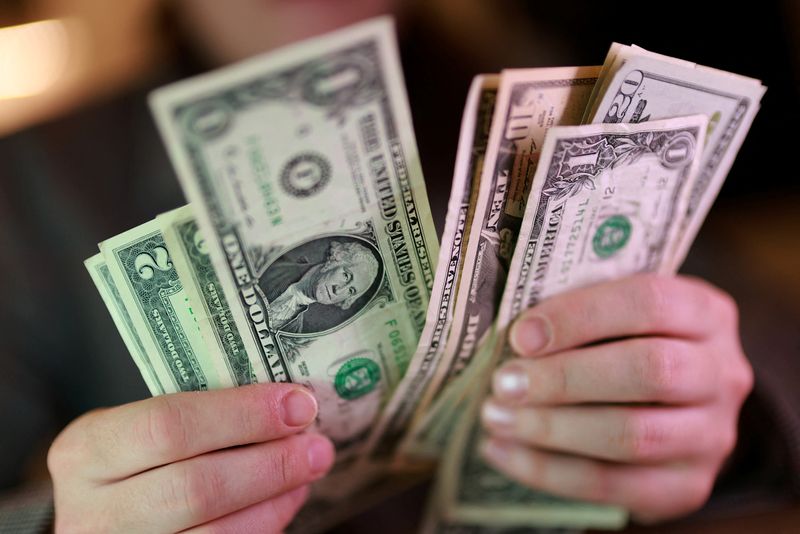 Dollar steadies near two-week high as Middle East hostilities lift oil