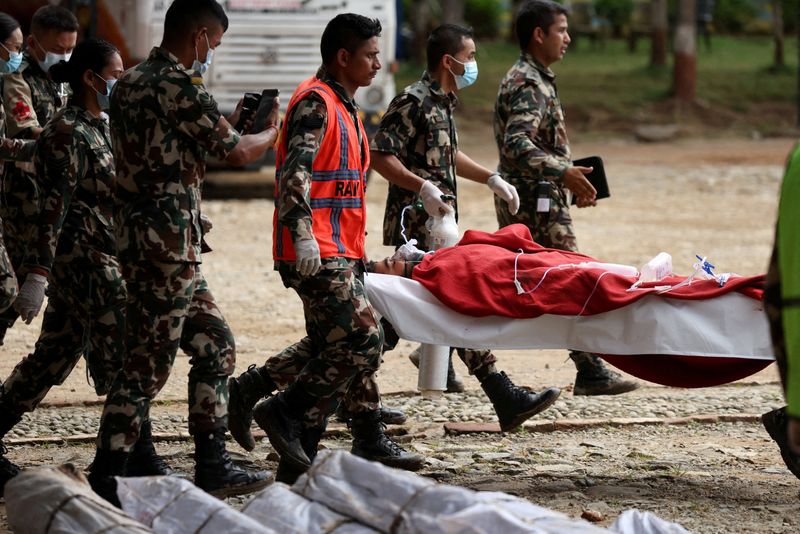 Nepali foreman rescued from tunnel says he stayed behind to help others