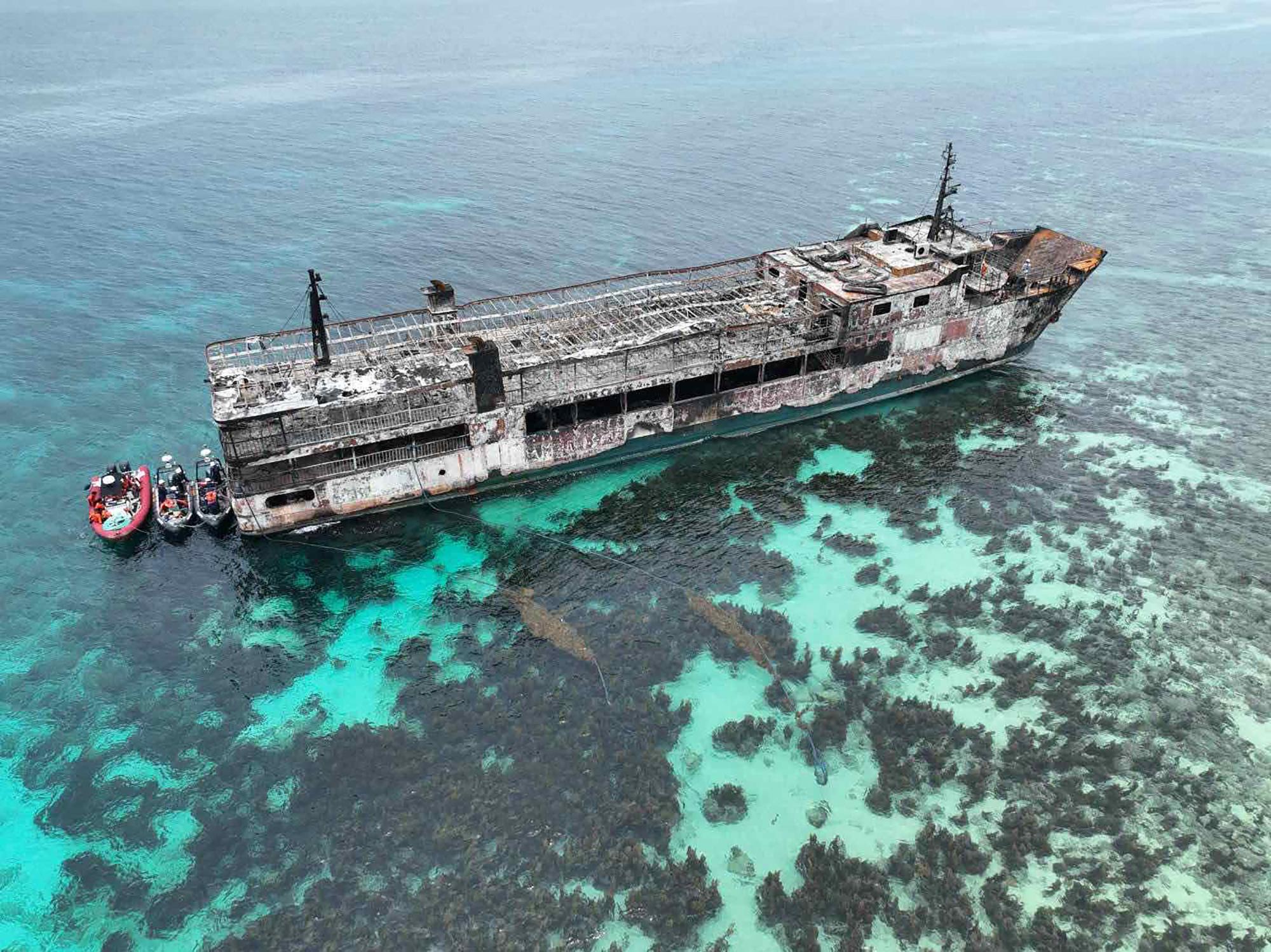 Philippine ferry fire death toll climbs to 76 as identification process begins