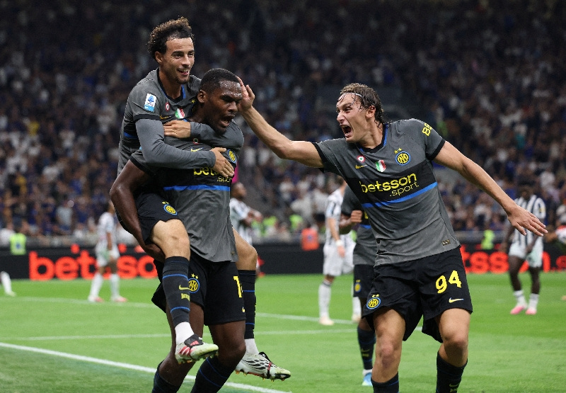 Inter rally past Udinese to stay level with Roma at Serie A summit