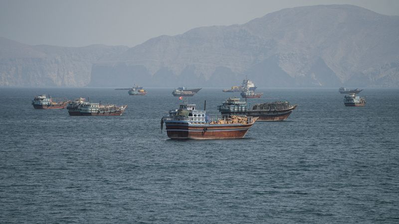 Two Singapore-registered vessels struck in Strait of Hormuz, one sinks