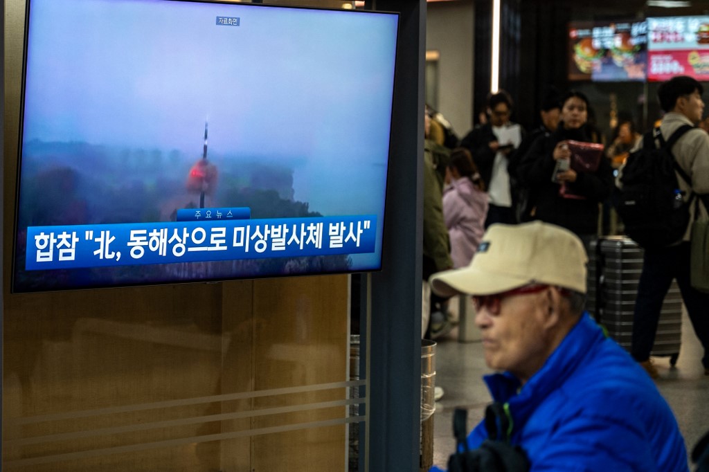 North Korea fires 'around a dozen' ballistic missiles into East Sea
