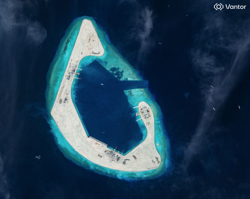 China conducts combat readiness patrols around disputed shoal in South China Sea